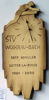 Uhr mit Hürdenläufer